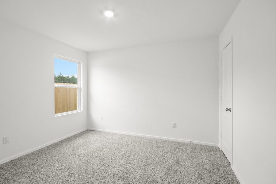 Spacious, unfurnished interior of a new home in Harrington Trails at The Canopies, Splendora (Image 9).