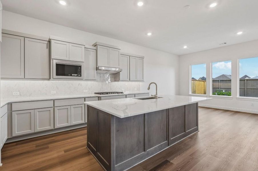 Furnished interior view inside a new home in The Grand Prairie 60', Hockley (Image 8).