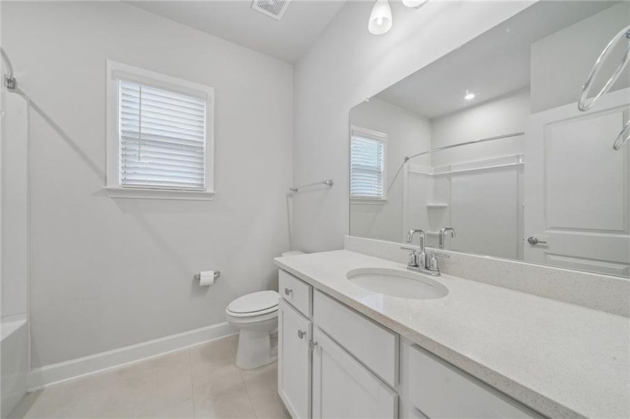 Furnished interior view inside a new home in Bennett Park, Grayson (Image 9).