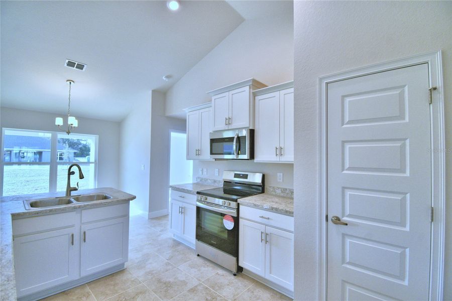 Furnished interior view inside a new home in Cadence Crossing, Auburndale (Image 8).