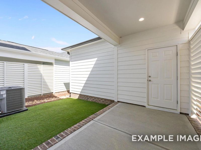 Exterior details and patio area of a home in Forestville Yard, Knightdale (Image 4).