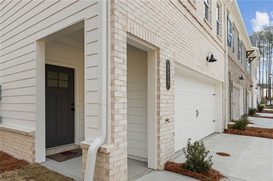 Exterior details and patio area of a home in River Walk Place, Lawrenceville (Image 3).