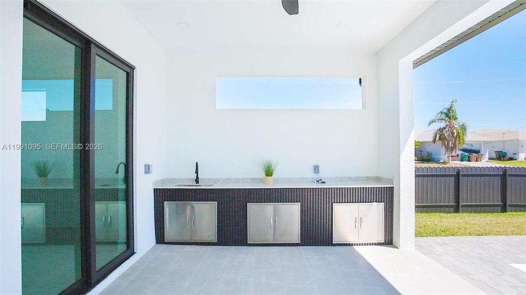 Enjoy your LANAI & PRIVATE POOL AREA w/ dedicated EXPANSIVE COUNTERTOP SPACE w/ 3 STORAGE AREAS & COMMERCIAL-GRADE SINK, perfect for alfresco dining & entertaining year-round. Enjoy your LANAI & PRIVATE POOL AREA w/ dedicated EXPANSIVE COUNTERTOP SPACE w/ 3 STORAGE AREAS & COMMERCIAL-GRADE SINK, perfect for alfresco dining & entertaining year-round.