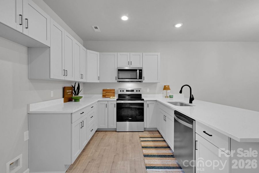 Furnished interior view inside a new home in , Concord (Image 11).