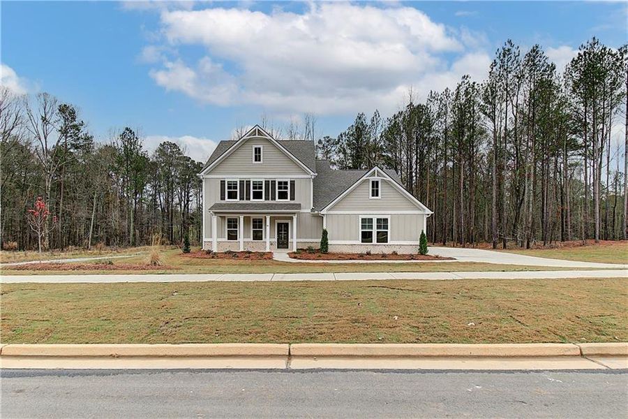 Front exterior of a new home in , Senoia, GA, highlighting curb appeal (Image 15).