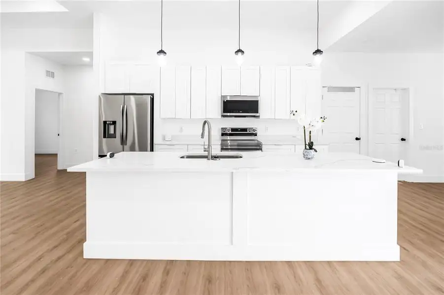 Furnished interior view inside a new home in , Clewiston (Image 6).