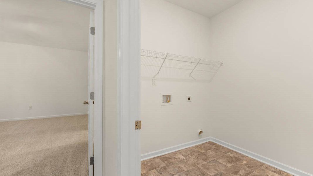 Representative unfurnished interior of a home built from the Dennis by D.R. Horton in Glenmaye, Hampton (Image 36).