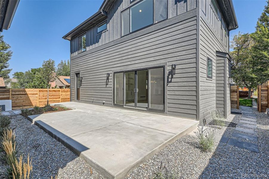 Expansive backyard patio perfect for relaxing and entertaining.