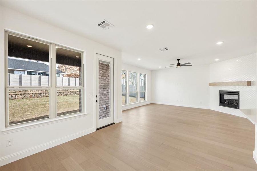Spacious, unfurnished interior of a new home in Painted Tree Woodland District 50, McKinney (Image 29).