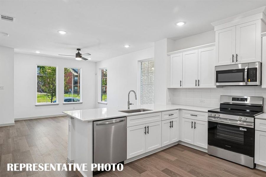 Entertaining is a breeze in this lovely home!  REPRESENTATIVE PHOTO