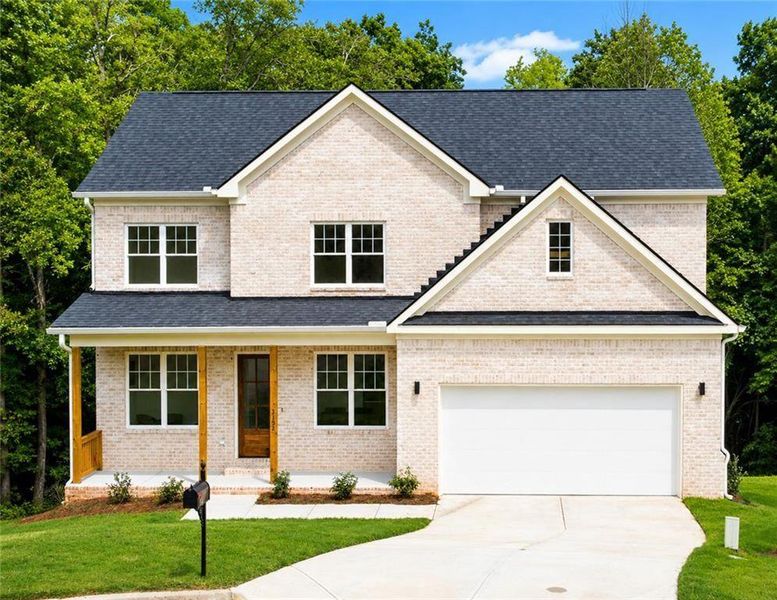Front exterior of a new home in , Douglasville, GA, highlighting curb appeal (Image 1). Front exterior of a new home in , Douglasville, GA, highlighting curb appeal (Image 1).