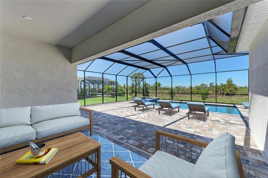 Exterior details and patio area of a home in EVERLY at Wellen Park, Venice (Image 23).