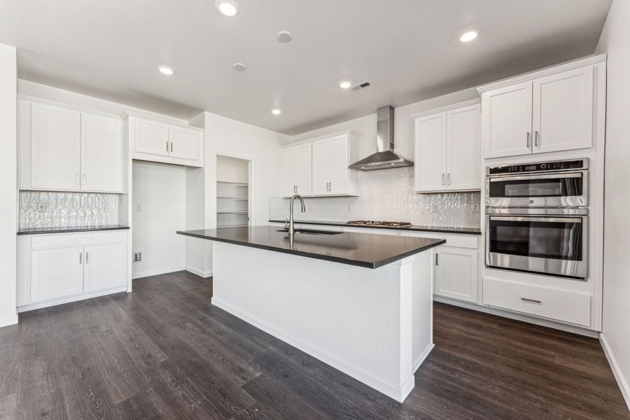 Representative furnished interior of a home built from the Sedalia by Taylor Morrison in Trailstone, Arvada (Image 27).