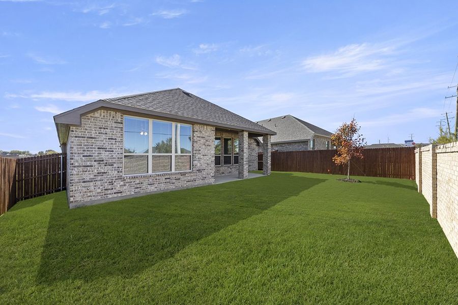 Representative exterior photo of a completed home built from the Cambridge by Impression Homes in Timberbrook, Justin, TX (Image 25). Representative exterior photo of a completed home built from the Cambridge by Impression Homes in Timberbrook, Justin, TX (Image 25).