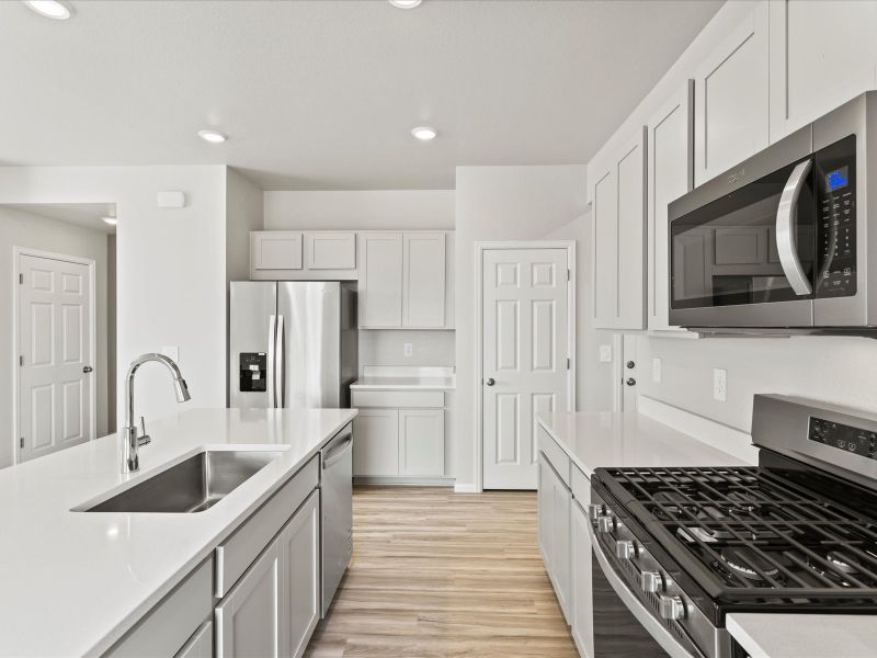 Furnished interior view inside a new home in Lake Bluff, Greeley (Image 5).