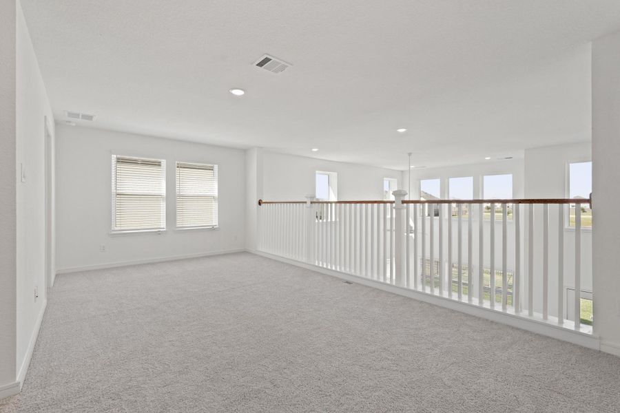 Versatile loft upstairs (*Photo not of actual home and used for illustration purposes only.) Versatile loft upstairs (*Photo not of actual home and used for illustration purposes only.)