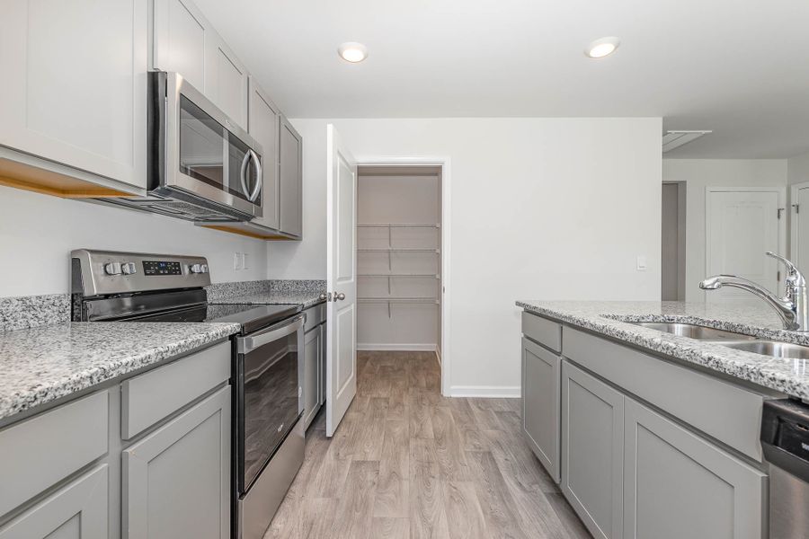 Representative furnished interior of a home built from the PENWELL by D.R. Horton in South Haven, Camden (Image 10).
