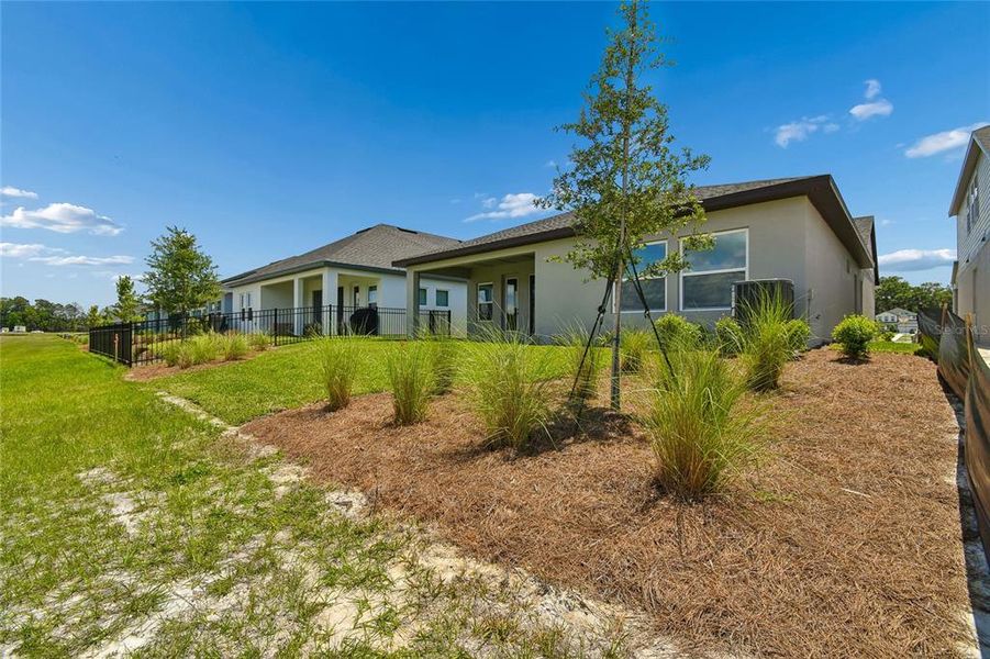 Exterior details and patio area of a home in Oakfield at Mount Dora Village Series, Mount Dora (Image 16). Exterior details and patio area of a home in Oakfield at Mount Dora Village Series, Mount Dora (Image 16).