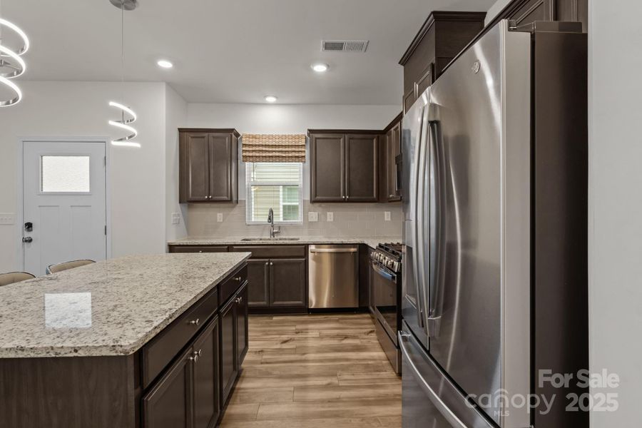 Furnished interior view inside a new home in , Charlotte (Image 8).