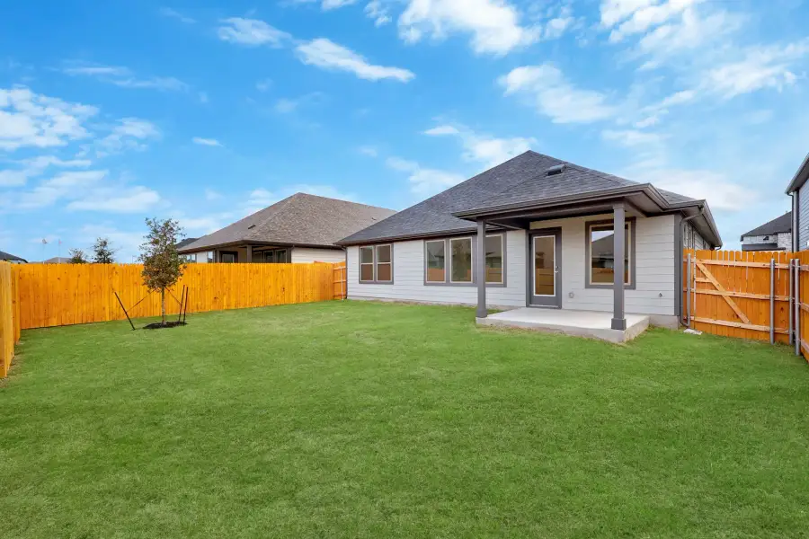 Exterior details and patio area of a home in Prairie Winds, Hutto (Image 20).