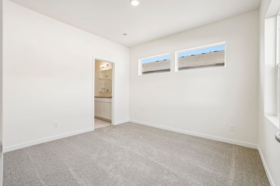Spacious, unfurnished interior of a new home in Union Colony West, Greeley (Image 28).
