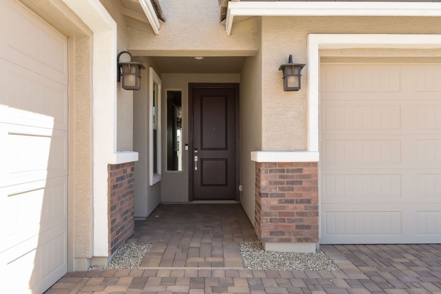 Representative exterior details of a home built from the Yellowstone by Taylor Morrison in Artisan at Asante Passage Collection, Surprise (Image 2). Representative exterior details of a home built from the Yellowstone by Taylor Morrison in Artisan at Asante Passage Collection, Surprise (Image 2).