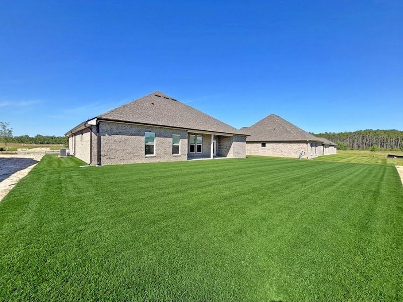 Exterior details and patio area of a home in Natureview, Freeport (Image 3).
