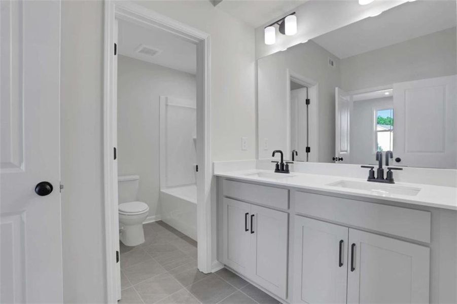 Furnished interior view inside a new home in The Paddocks at Doc Hughes, Buford (Image 13).