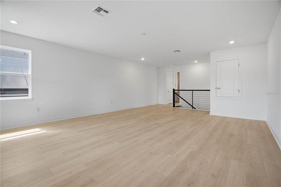 Spacious, unfurnished interior of a new home in Bella Collina, Montverde (Image 34).