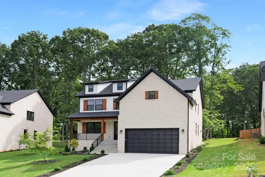 Front exterior of a new home in , Charlotte, NC, highlighting curb appeal (Image 16).