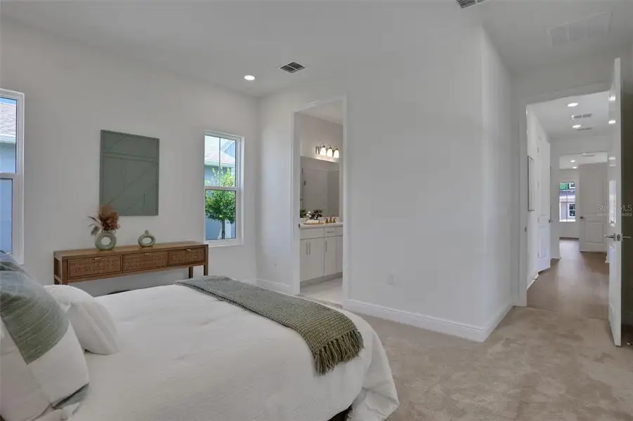 Furnished interior view inside a new home in Bungalow Walk at Lakewood Ranch, Sarasota (Image 9).