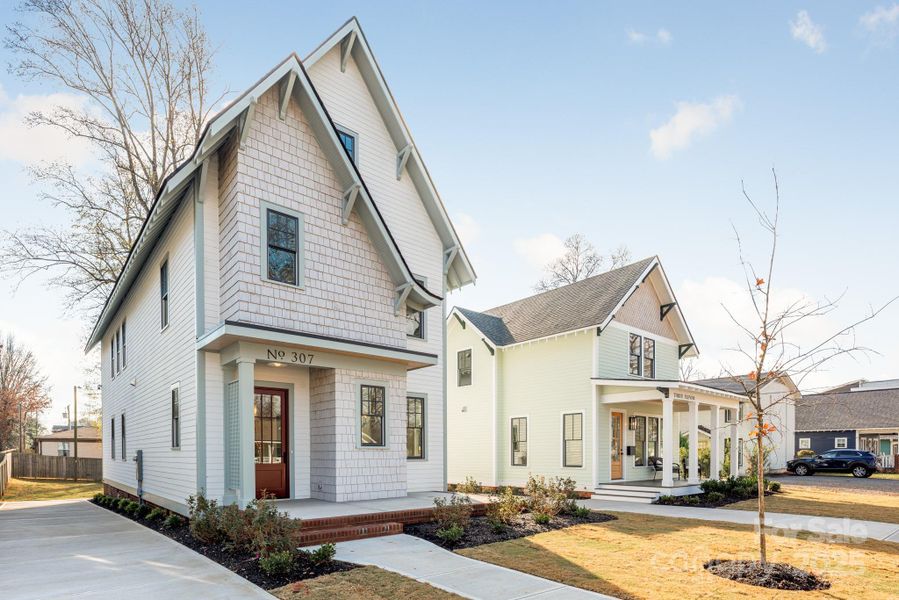 Front exterior of a new home in , Charlotte, NC, highlighting curb appeal (Image 24).
