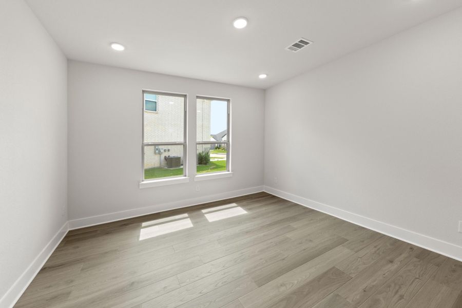 Spacious, unfurnished interior of a new home in Inspiration Collection at Union Park, Little Elm (Image 9).