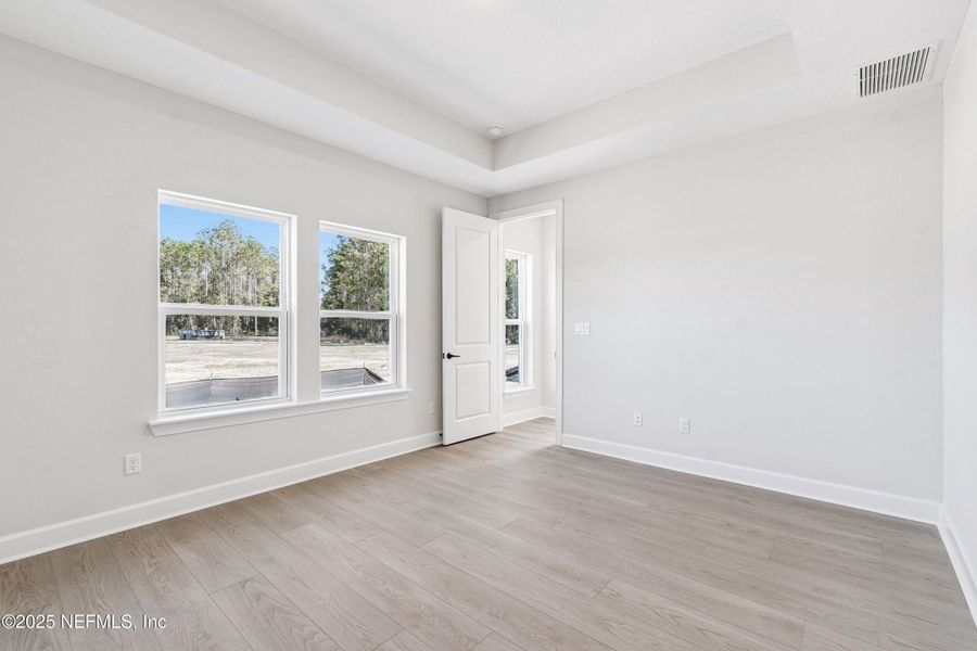 Spacious, unfurnished interior of a new home in Evergreen Island at Silverleaf - Classic, St. Augustine (Image 26). Spacious, unfurnished interior of a new home in Evergreen Island at Silverleaf - Classic, St. Augustine (Image 26).