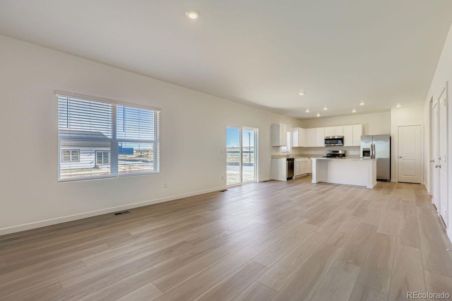 Spacious, unfurnished interior of a new home in Eastcreek Farm: The Camden Collection, Thornton (Image 8).
