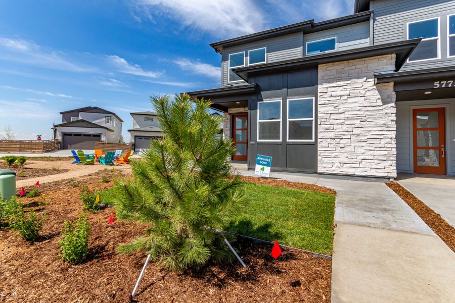 Front exterior of a new home in Painted Prairie, Aurora, CO, highlighting curb appeal (Image 2). Front exterior of a new home in Painted Prairie, Aurora, CO, highlighting curb appeal (Image 2).