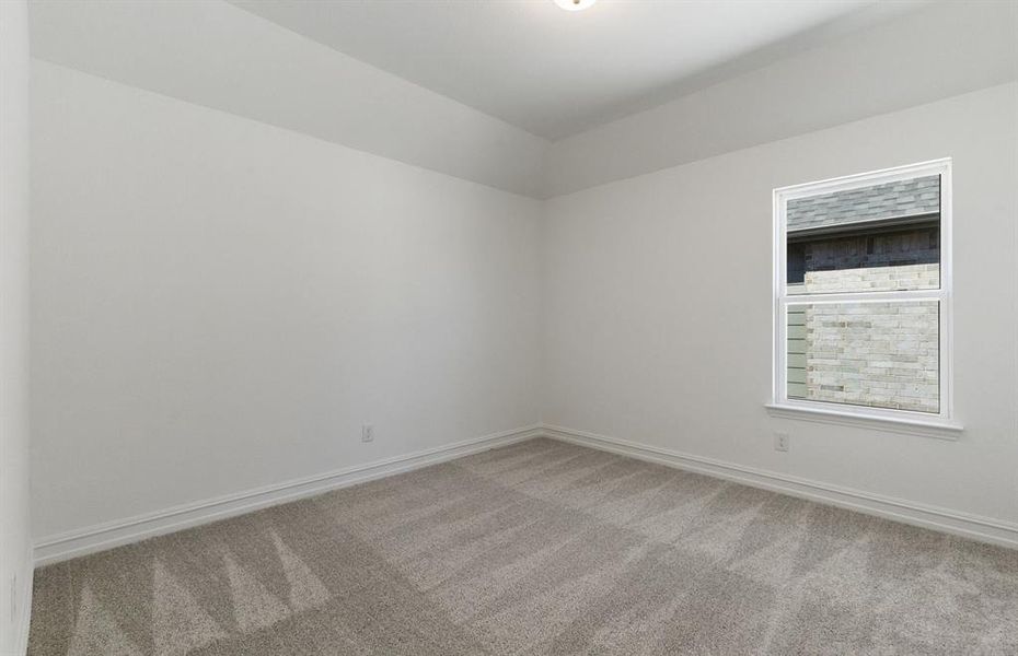 Spacious secondary bedroom with ample closet space*real home pictured