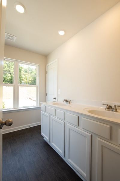 Representative furnished interior of a home built from the Fairfax by Piedmont Residential in Falls Creek, Flowery Branch (Image 8).
