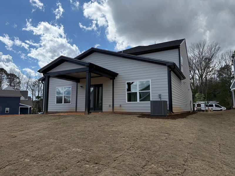 Exterior details and patio area of a home in Rowland's Grant, Fuquay Varina (Image 5). Exterior details and patio area of a home in Rowland's Grant, Fuquay Varina (Image 5).