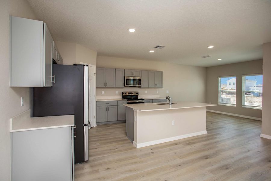 Furnished interior view inside a new home in Villa Mar, Winter Haven (Image 7).