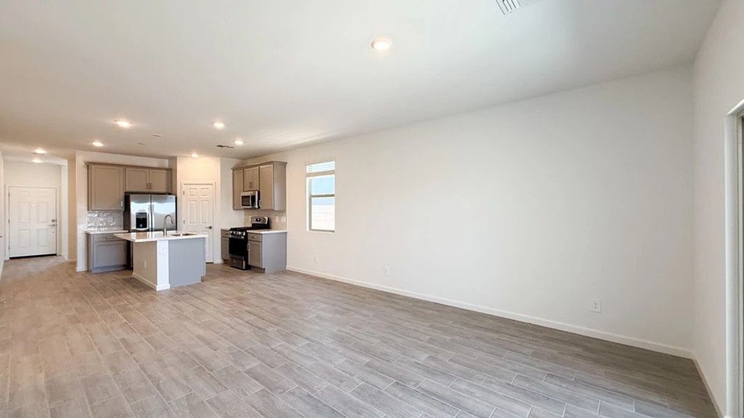 Great room, dining and kitchen Great room, dining and kitchen