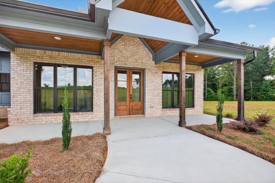 Front exterior of a new home in , Dallas, GA, highlighting curb appeal (Image 21). Front exterior of a new home in , Dallas, GA, highlighting curb appeal (Image 21).