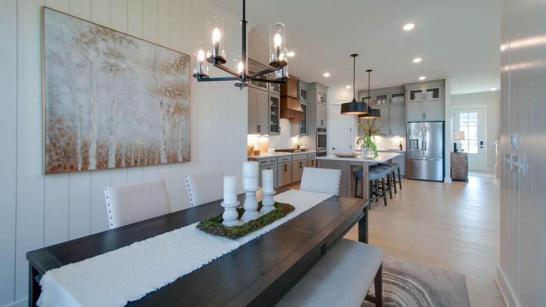 Dedicated dining area with large windows just off of the kitchen Dedicated dining area with large windows just off of the kitchen
