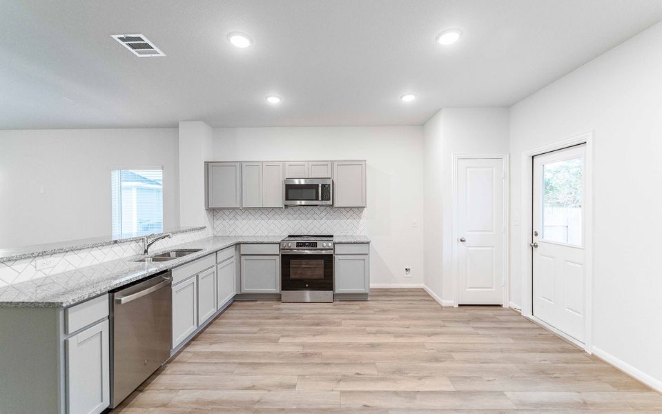 Furnished interior view inside a new home in Grande Estates, Bertram (Image 7). Furnished interior view inside a new home in Grande Estates, Bertram (Image 7).