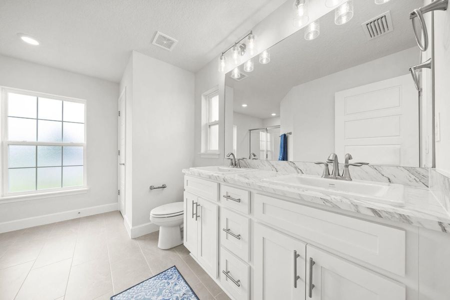 Representative furnished interior of a home built from the 1635 by Adams Homes in Winding Oaks, Weeki Wachee (Image 11).