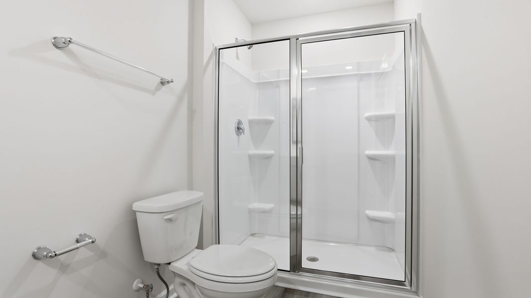 Furnished interior view inside a new home in Bentley Park, Greenwood (Image 13).