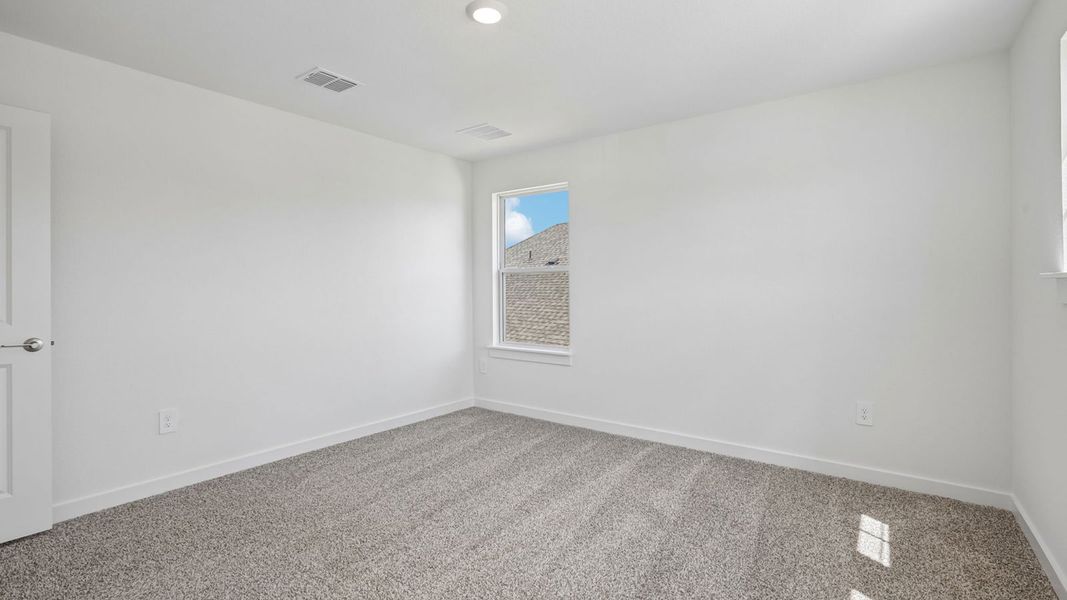 Spacious, unfurnished interior of a new home in Rosenbusch Ranch, Leander (Image 42).