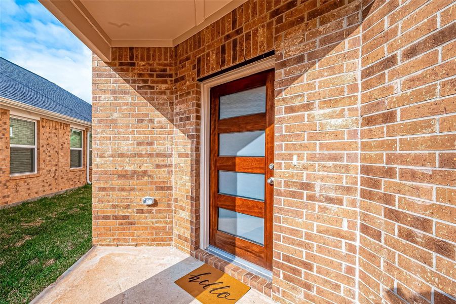 Exterior details and patio area of a home in Sunterra, Katy (Image 3). Exterior details and patio area of a home in Sunterra, Katy (Image 3).