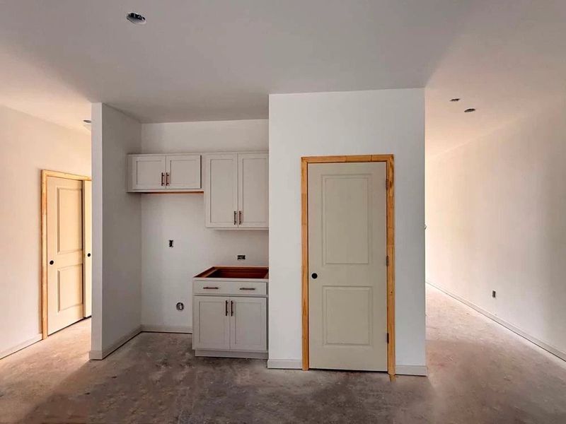 Kitchen featuring Serene Collection Finishes Construction Progress Kitchen featuring Serene Collection Finishes Construction Progress