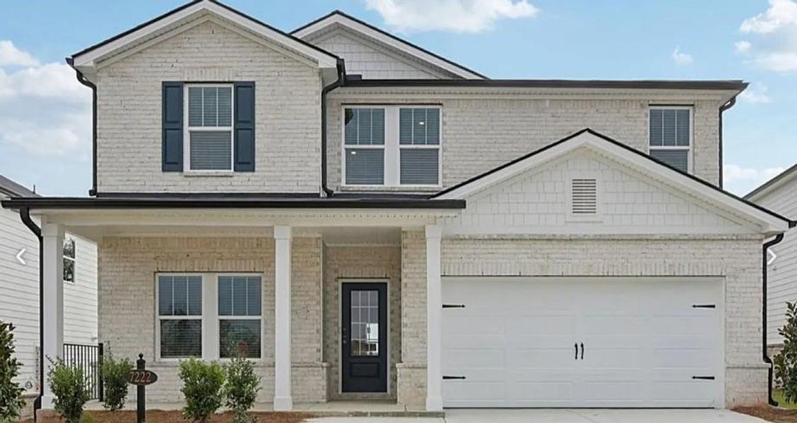 Front exterior of a new home in Harmony Manor, Fairburn, GA, highlighting curb appeal (Image 1).